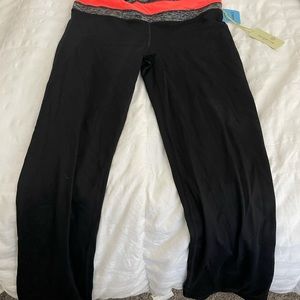 Black Tangerine yoga type pants w a bright orange band- never worn